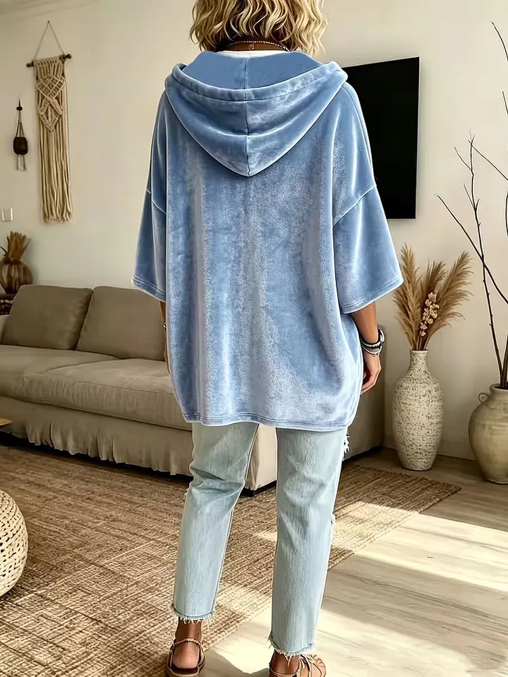 Damestop van effen fluweel met driekwartmouwen, casual model.